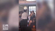 Indiana coffee shop stunned as couple steps into store and hosts full wedding ceremony