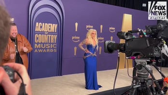 Jelly Roll walks the ACM Awards red carpet with wife, Bunnie Xo