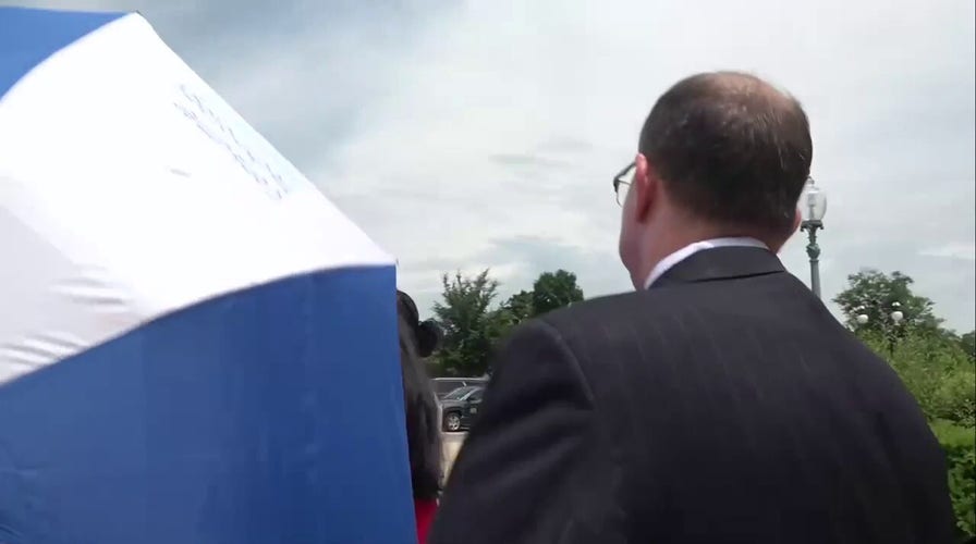 Staffer for Democratic Rep. Tlaib tries to obstruct Fox cameraman