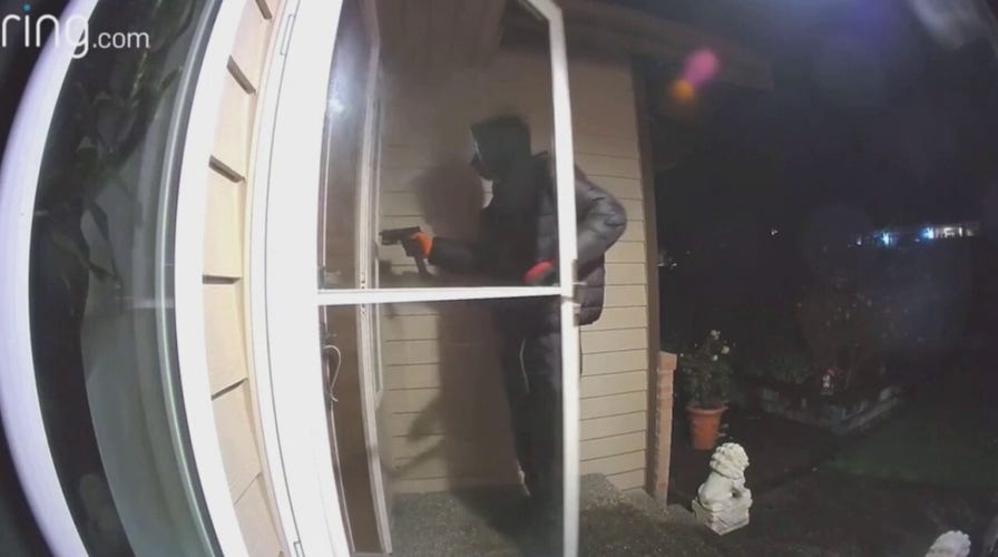Armed suspect follows Washington family home, attempts to push way through front door