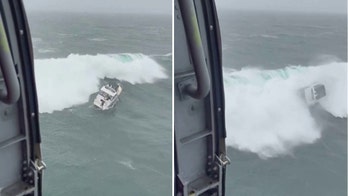 Coast Guard rescues wanted man seconds before massive wave capsizes boat