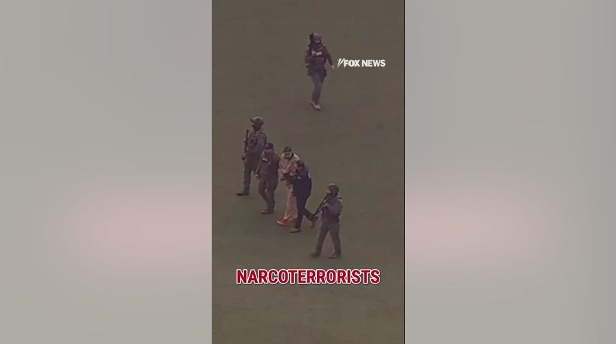 Handcuffed Maduro takes chopper to Manhattan court