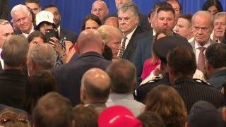 President Trump walks off stage to comfort grieving parents