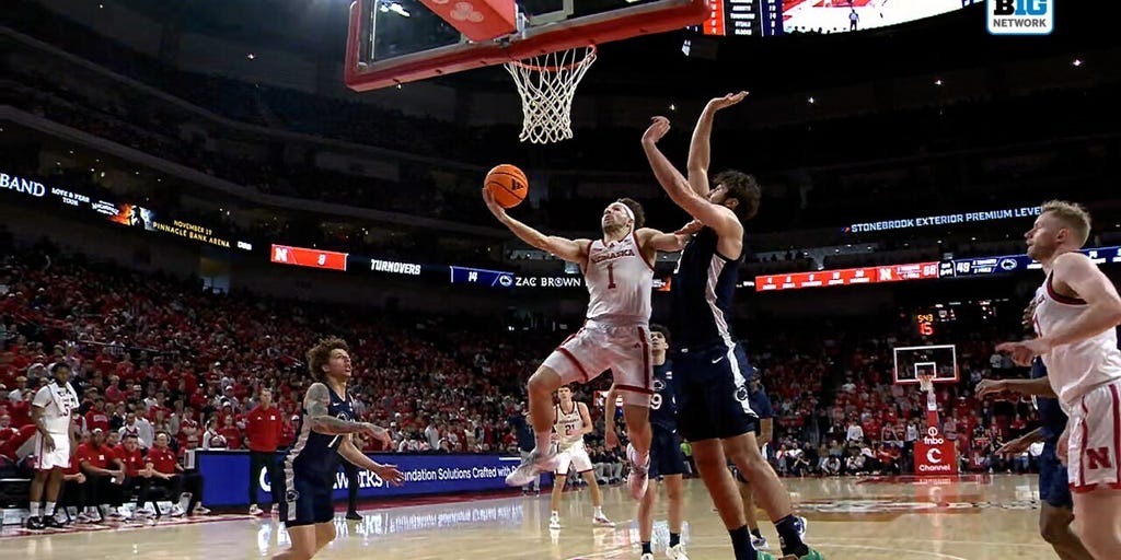 Nebraska's Sam Hoiberg attacks the rim and finishes for an and-one vs. Penn State