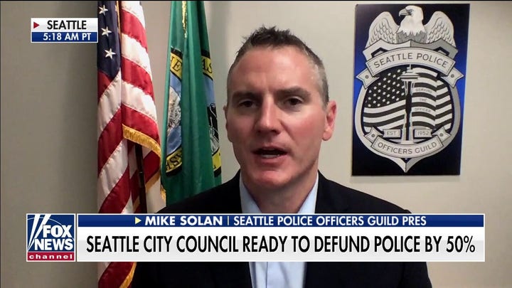 Mike Solan reacts as Seattle City Council ready to defund police dept. by 50 percent