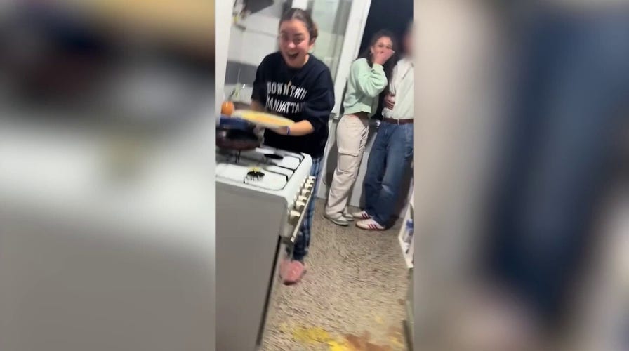 Massive egg drop as woman tosses omelette on the floor while attempting to flip it