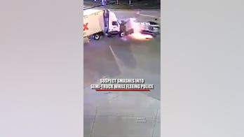 Suspect smashes into semi-truck during police chase