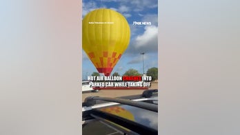 Hot air balloon CRASHES into parked car while taking off