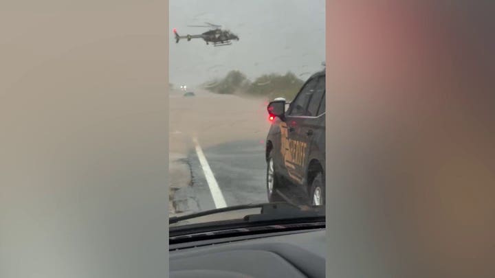 Arizona sheriff deploys helicopter to save 2 people stranded in flooded car during heavy rains