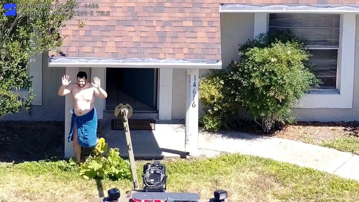 Towel-wearing suspect arrested by SWAT team 