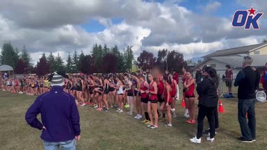Biological male warms up before race against girls at cross country meet
