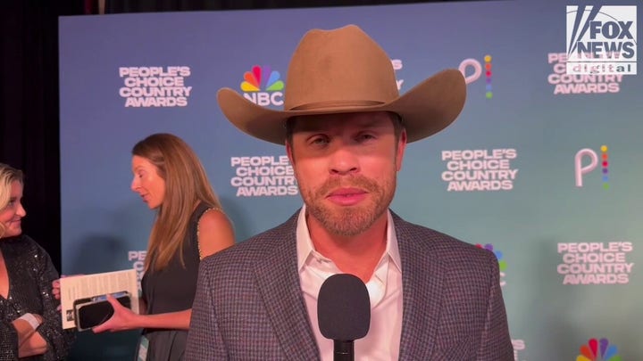 Dustin Lynch calls Toby Keith one of his 'musical heroes'