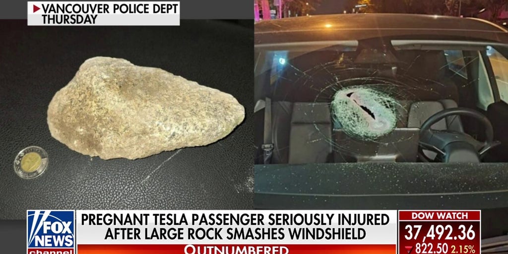 Pregnant Tesla passenger 'seriously injured' after large rock smashes windshield