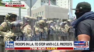 National guard troops arrive in Los Angeles amid violent anti-ICE protests