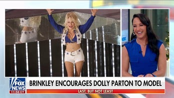 Dolly Parton hits new milestone, encouraged to model