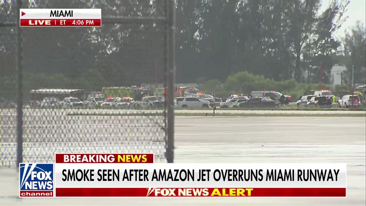 Amazon cargo jet overruns runway at Miami airport, strikes multiple vehicles