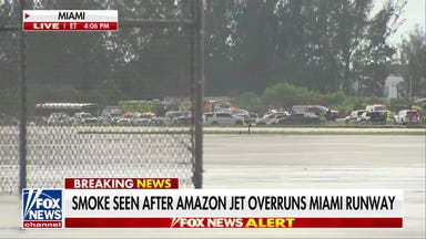 Amazon cargo jet overruns runway at Miami airport, strikes multiple vehicles