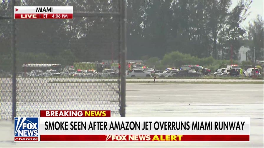 Amazon cargo jet overruns runway at Miami airport, strikes multiple vehicles