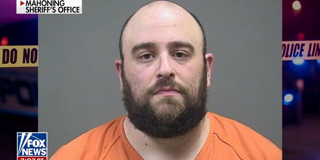 Armed man arrested after lunging at Democratic candidate Amy Acton