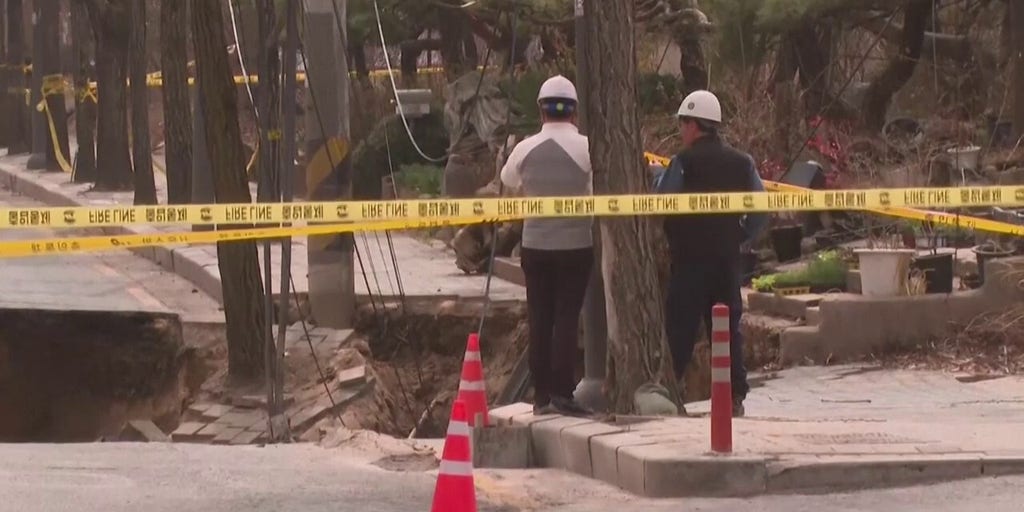Massive sinkhole swallows motorcyclist in South Korea