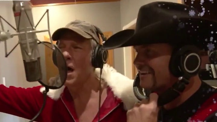 Mike Rowe (left) and John Rich have released their new Christmas song — and it's a winner!
