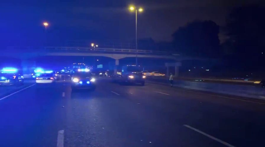 4 men wounded in Alabama interstate shoot-out over alleged stolen car
