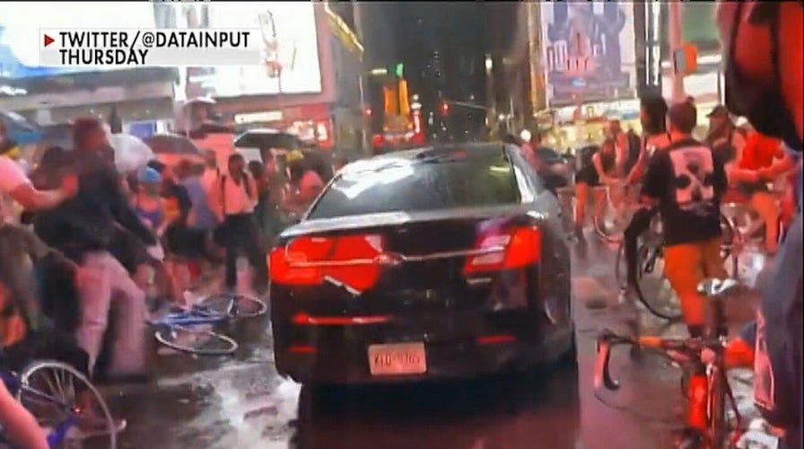 Car rams through crowd gathered in Times Square to protest Daniel Prude's death