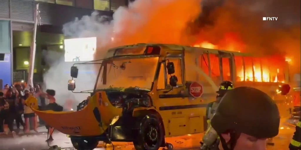 School bus engulfed in flames on 42nd Street as Knicks fans celebrate