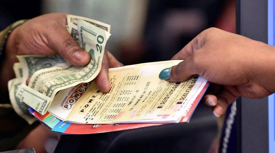 Can simply playing Powerball make you happier?