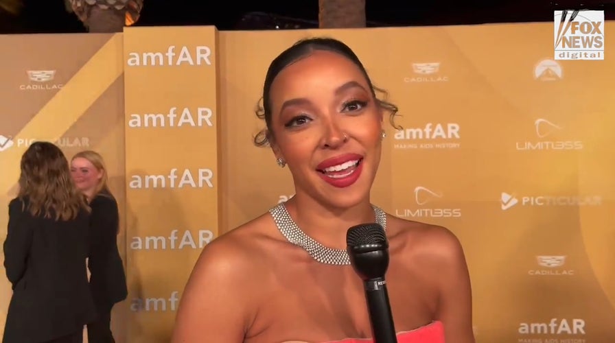 Singer Tinashe teases new music with Calvin Harris and more at amfAR Gala
