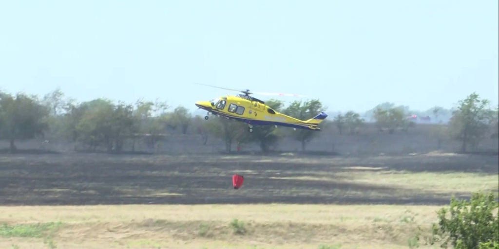 Military helicopter crashes near Salado, Texas, sparking major grass fire