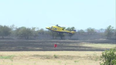 Military helicopter crashes near Salado, Texas, sparking major grass fire