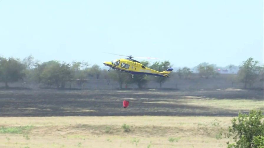Military helicopter crashes near Salado, Texas, sparking major grass fire