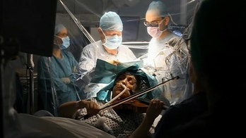 Woman plays violin during brain surgery to remove tumor