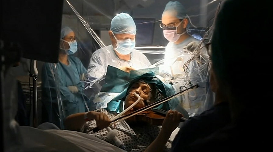 Patient plays violin while surgeons remove brain tumor