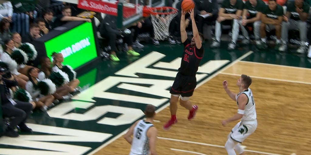 Kaspar Sepp Crosses Up Defender and Throws Down Slam Dunk for Cornell vs. Michigan State
