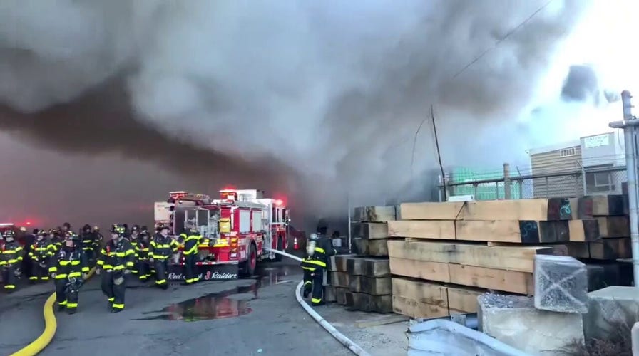 FDNY battles massive blaze at NYPD evidence station in Brooklyn