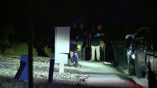 FBI appear outside suspected Colorado attacker's home