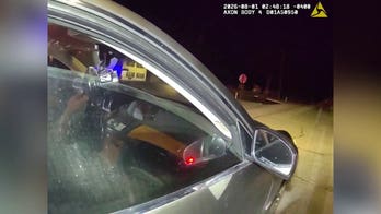 WATCH: Wild traffic stop turns chaotic as suspect drives off with one cop inside, drags second officer