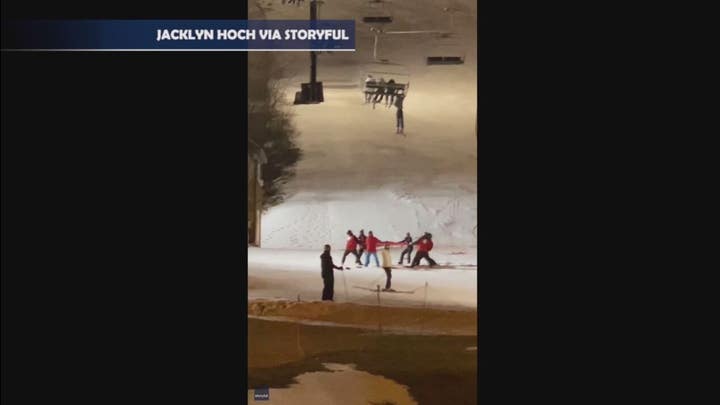 Skier rescued after dangling from resort chairlift