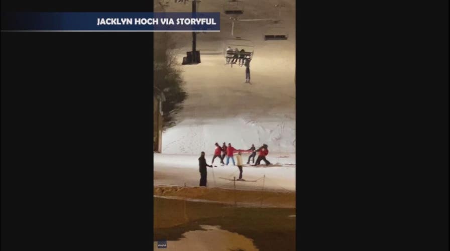 Skier rescued after dangling from resort chairlift