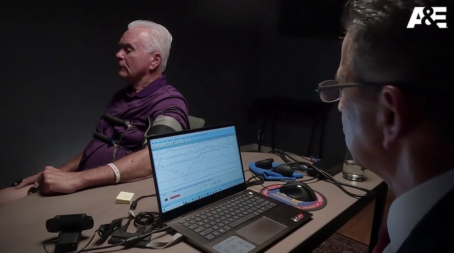 George Anthony answers a question while taking a polygraph test