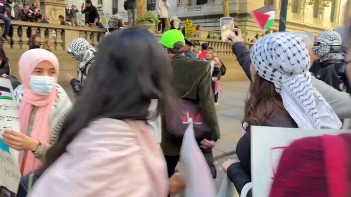 NYPD takes pro-Palestinian protester into custody during protest