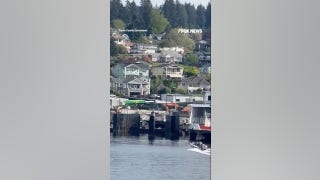 Boater appears UNCONSCIOUS before speeding into rocks