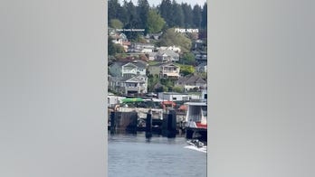 Boater appears UNCONSCIOUS before speeding into rocks