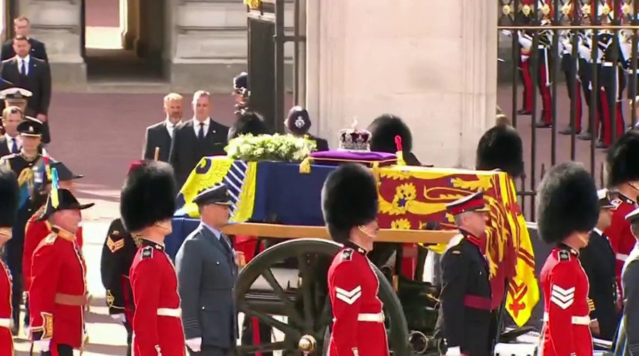 The King and members of the royal family accompany Queen Elizabeth II's coffin to the Palace of Westminster