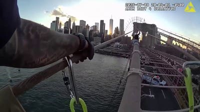 Police pull woman to safety atop Brooklyn Bridge after tense rescue operation