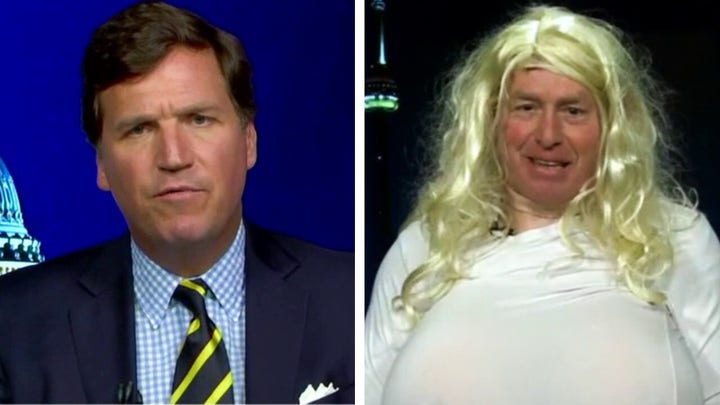 Commentator dresses in same busty fetish gear as trans teacher to prove point