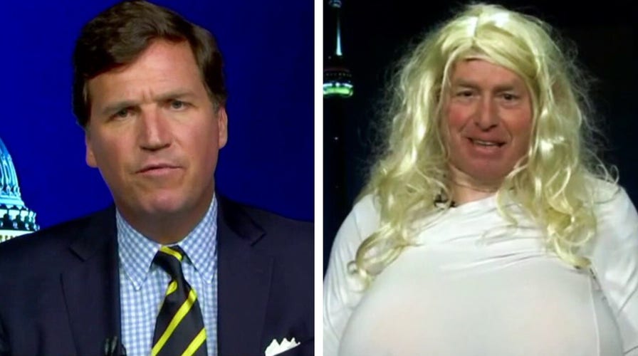 Commentator dresses in same busty fetish gear as trans teacher to prove point