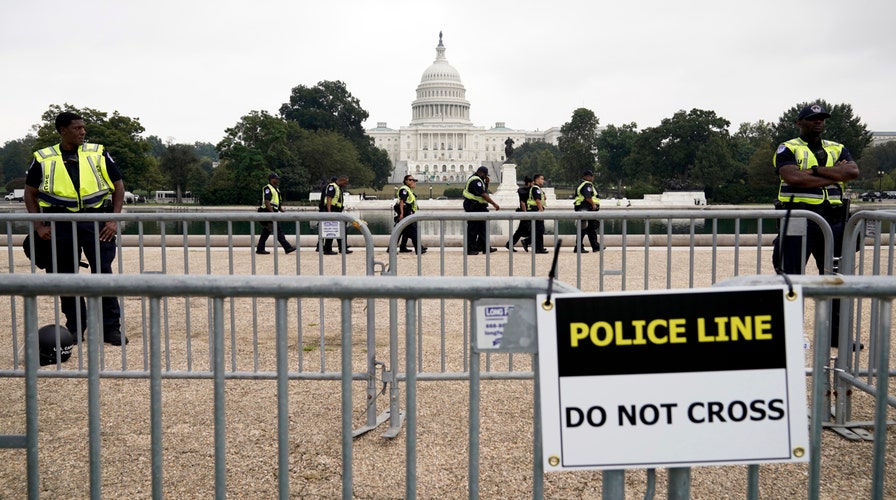 Demonstrators gather at the US Capitol for the "Justice for J6" rally